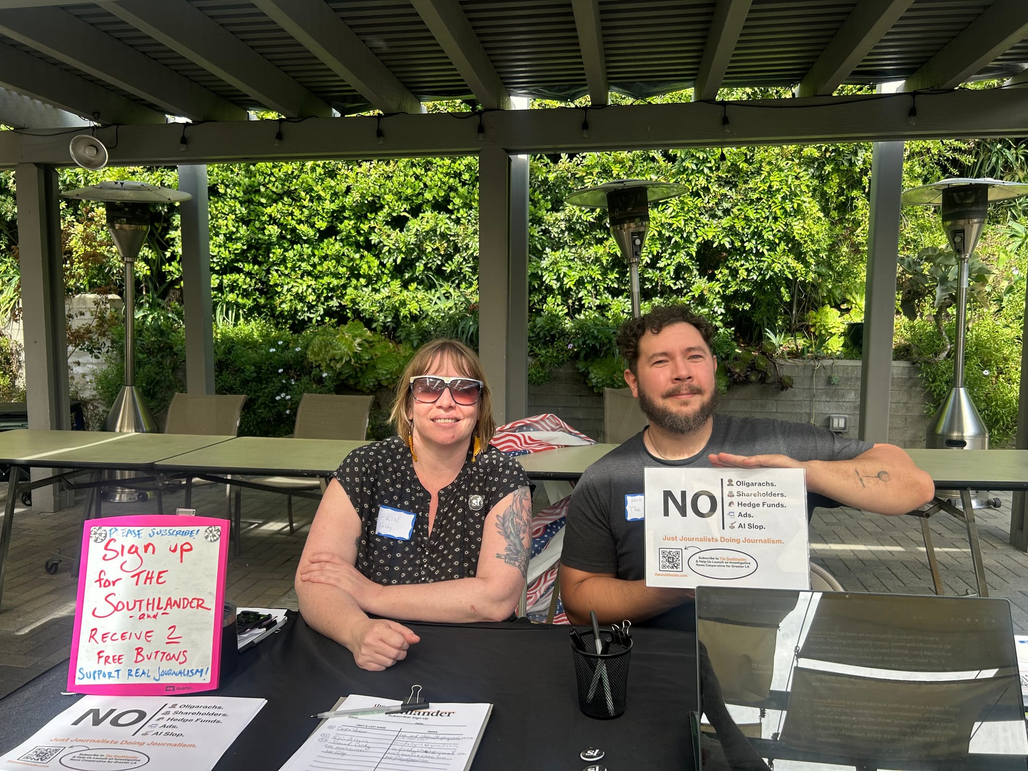 Co-founders Erin Foley and Kevin Flores tabling at We the People South Bay in Rancho Palos Verdes on Sunday.